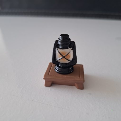 Lámpara de aceite a escala