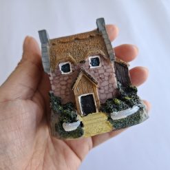 Casa en miniatura decorativa