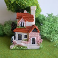 Casa en miniatura decorativa