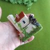 Casa en miniatura decorativa