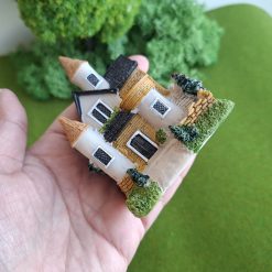 Casa en miniatura decorativa