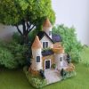 Casa en miniatura decorativa