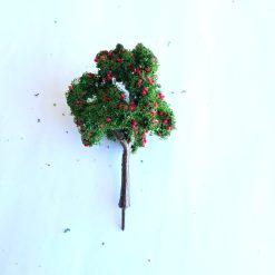 Árbol frutal rojo a escala