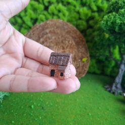 Casa rocosa a escala